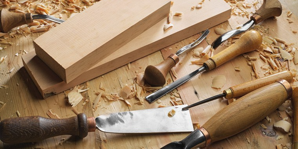 What are the essential wood carving tools?